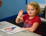 Honey Boo Boo signs autographs at the amusement arcade in Milledgeville