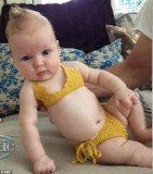 Jessica Simpson showed off little Maxwell's first swimsuit yesterday as she shared a photo of the adorable four-month-old on Katie Couric's new chatshow