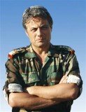 Key Syrian defector General Manaf Tlas has hinted that French secret agents helped him flee Syria in early July