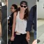 Kristen Stewart wears Robert Pattinson’s baseball cap as she jets out of Toronto