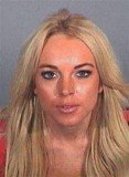 Lindsay Lohan was arrested on charges that she clipped a pedestrian with her car and did not stop