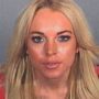 Lindsay Lohan arrested after clipping a pedestrian with her car