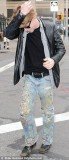 Macaulay Culkin was quite the walking canvas on Thursday as he wandered around New York in jeans slathered in paint