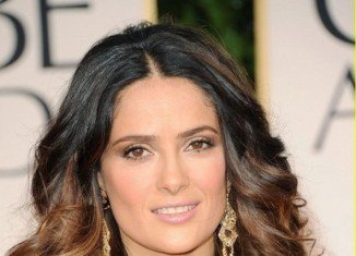 Salma Hayek has admitted that she achieves her skin perfection by never washing her face when she wakes up in the morning
