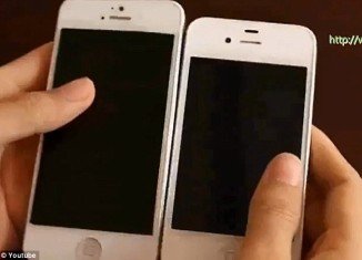 The video shows off the iPhone's larger display, and the dock port which has caused much consternation for Apple fans who own accessories and cables which will not fit the new model