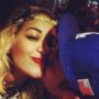 Robert Kardashian and Rita Ora admit their romance as they post Twitter pictures of themselves kissing