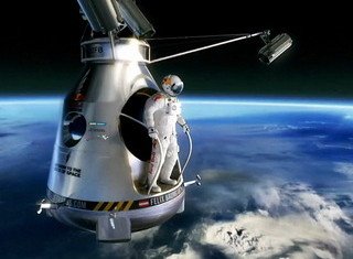 Felix Baumgartner has lifted off on his mission to break a series of freefall records
