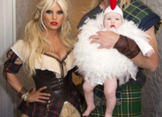 Jessica Simpson opted for a racy Halloween costume that showed off her newly slimmed-down waist