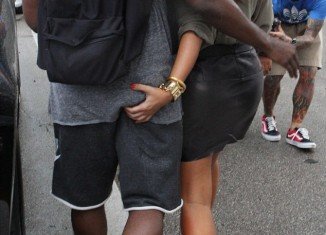 Kim Kardashian was caught intimately squeezing boyfriend Kanye West's backside