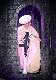 Lady Gaga showed off a machine gun at her audience as she performed in Milan