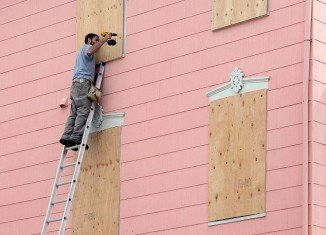 New Jersey people board up their homes in preparation for Hurricane Sandy