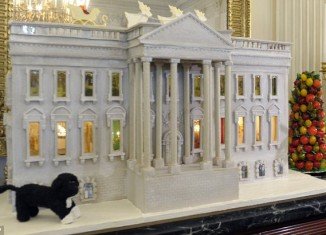 A 300 lbs gingerbread replica of the White House was the centrepiece of the White House Christmas decorations, unveiled Wednesday by First Lady Michelle Obama