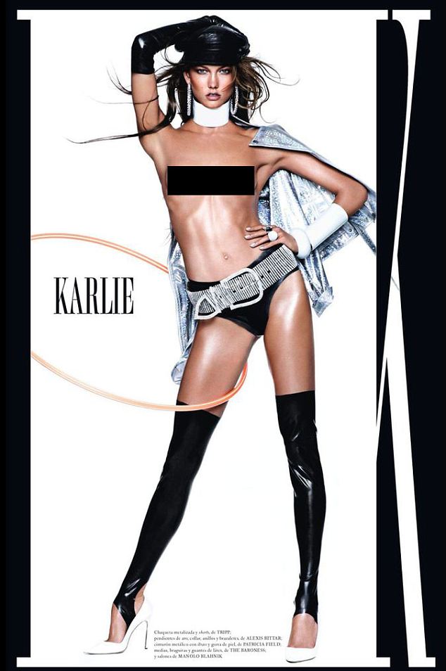 A heavy-handed creative appears to have added an extra armpit to Karlie Kloss in her latest shoot for Vogue magazine
