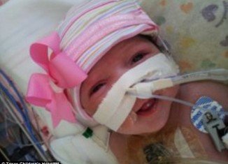 Audrina Cardenas, a baby girl who was born with her small heart beating outside of her body, is now remarkably recovering after a revolutionary surgery saved her life