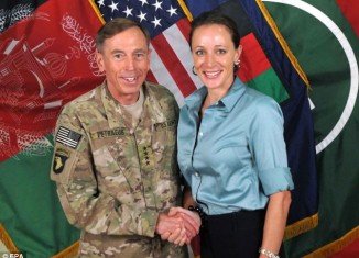 David Petraeus and Paula Broadwell were seen chatting together at a high-profile intelligence event after they learned the FBI had launched an investigation into their affair