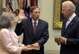 David Petraeus was sworn in as CIA chief in September 2011 by Joe Biden with his wife Holly at his side