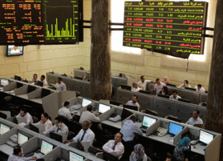Egypt's stock market sees a plunge in its shares after President Mohammed Mursi granted himself sweeping new powers