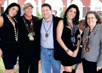 Jill Kelley and her twin sister Natalie Khawam pictured with David Petraeus and his wife