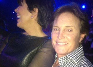Kris Jenner jumped on Bruce Jenner's lap for some PDA action in front of crowds at X Factor