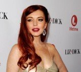 Lindsay Lohan has been arrested after getting into a fight at Club Avenue in New York City and allegedly punching another woman