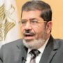 Mohammed Mursi defends new decree that grants him new sweeping powers amid protests