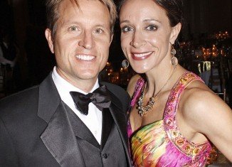 Paula Broadwell looks determined to prove that her marriage is back on track following the highly public fallout over her affair with ex-CIA chief General David Petraeus
