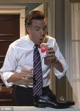 Saturday Night Live began their weekly show with the defeated Massachusetts governor Mitt Romney drowning his sorrows with milk