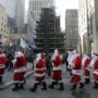 Sidewalk Santa Parade 2012: Fifty Santas march down Fifth Avenue to kick off Christmas season