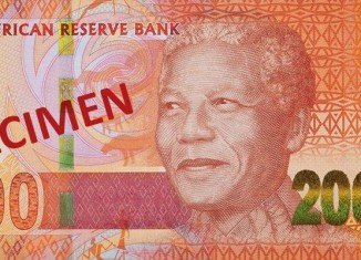 The first banknotes featuring the face of former President Nelson Mandela have gone into circulation in South Africa
