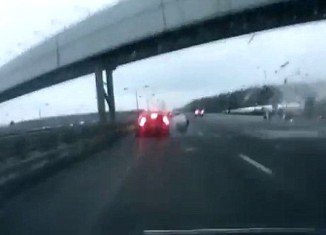 A video of Moscow plane crash has emerged showing how close one motorist came to becoming another victim of the deadly event