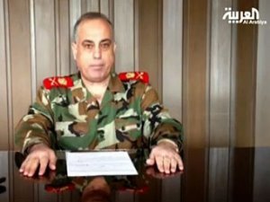Abulaziz al-Shalal, commander of Syria's military police, has defected from President Bashar al-Assad's government and reportedly fled to Turkey