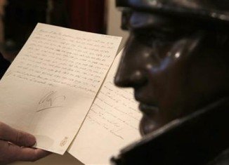 An 1812 letter written by Napoleon Bonaparte in which he vows to blow up the Kremlin has been sold at a Paris auction for 150,000 euros