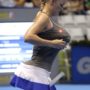 Caroline Wozniacki impersonates Serena Williams by stuffing her bra and shorts