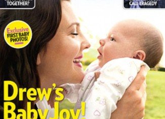 Drew Barrymore has intoduced baby daughter Olive to the world on the cover of People magazine