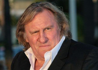 Gerard Depardieu was spotted stocking up on his favorite cheese before flying to Italy, sparking rumors that he has finally left France for good