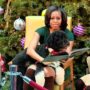 Michelle Obama reads Twas The Night Before Christmas to sick children in hospital but Bo steals the show