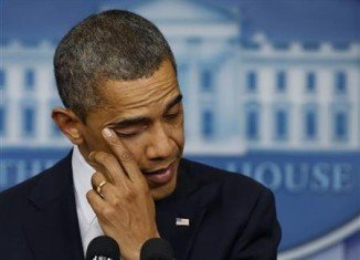 President Barack Obama is scheduled to travel to Newtown, Connecticut tonight to meet the families of victims killed in Friday's shooting at Sandy Hook Elementary School