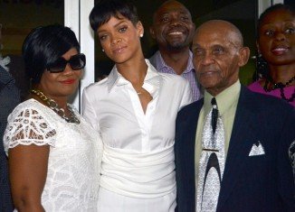 Rihanna was accompanied by grandmother Dolly's husband, Lionel, and her mother, Monica Fenty as she has donated $1.75 million to a Barbados cancer hospital