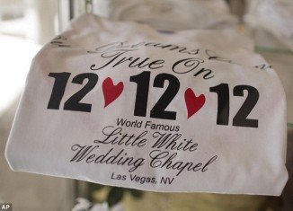 Thousands of brides hoping to add some auspicious significance to their walk down the aisle tie the knot on December 12th 2012, the last triple-digit date for one hundred years