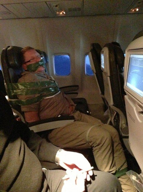 passenger duct taped to seat