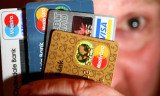 A new credit card rule going into effect Sunday, January 27, 2013, could cost you more when shopping with a credit card at some stores