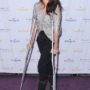 Andie MacDowell on crutches on the red carpet