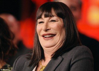 Anjelica Huston has been revealed as the latest celebrity pillow face victim, after displaying her suspiciously plump cheeks