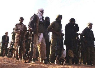 France is ready to stop Islamist militants who control northern Mali if they continue their offensive, President Francois Hollande has said
