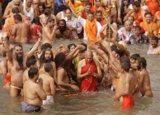 Hundreds of thousands of people have been bathing at the confluence of the Ganges and Yamuna rivers at Allahabad in India, on the opening day of the 2013 Kumbh Mela festival