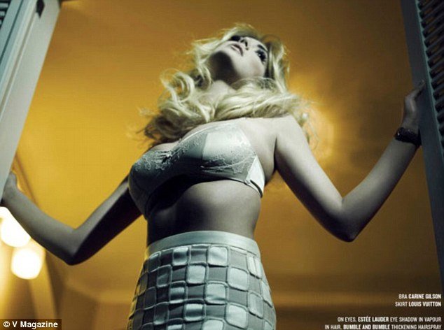 Kate Upton has posed for V magazine in a series of poses that evoke the seedy spirit of the early '60s