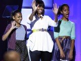 Michelle Obama paraded her new haircut as she took the stage with her daughters at Kids' Inaugural Concert