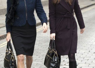 Rather than sharing a designer bag named after Pippa herself, Carole Middleton and her daughter Pippa both have their own version of Modalu handbag