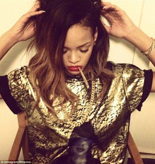 Rihanna shared a snap of herself smoking suspicious hand-rolled cigarette while taking a break from rehearsals for her world tour