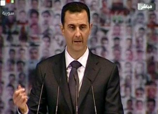 Syria’s President Bashar al-Assad has delivered a rare TV address, denouncing his opponents as enemies of God and puppets of the West